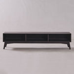 Black rectangular table on a plain light gray background