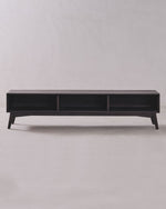 Black rectangular table on a plain light gray background