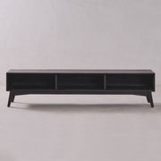 Black rectangular table on a plain light gray background