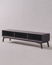 Dark wood TV stand on a light gray background