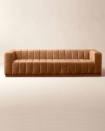 Brown sofa on a beige background
