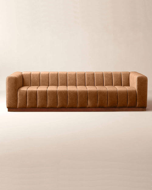 Brown sofa on a beige background